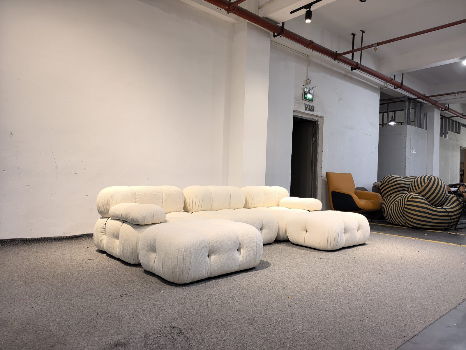 Large sectional sofa in upholstery atelier