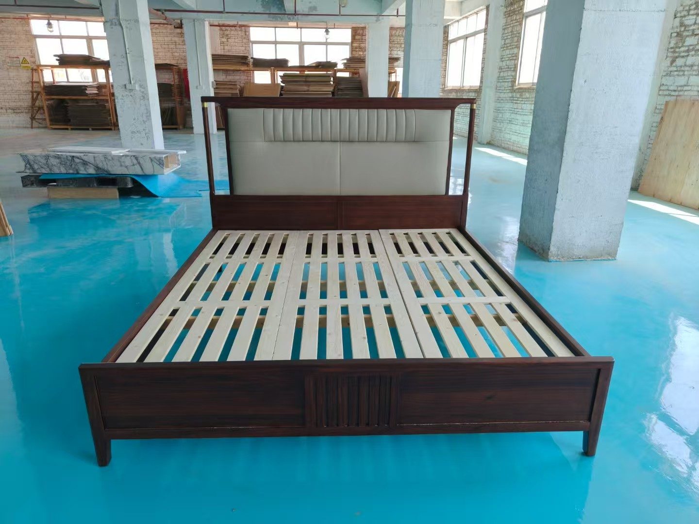 Bed frame with low-profile headboard